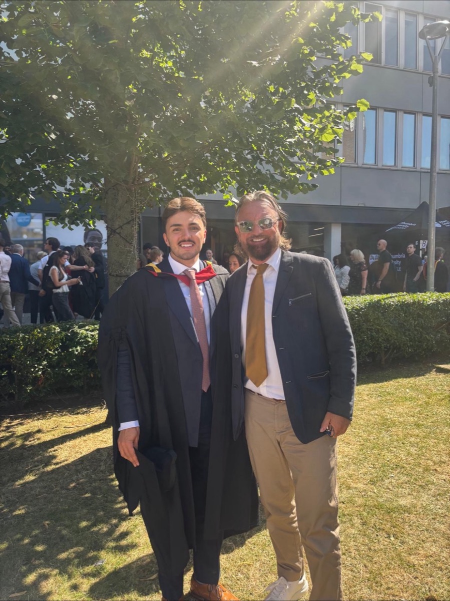 Terry Fisher with his son Harry on Harry's graduation day